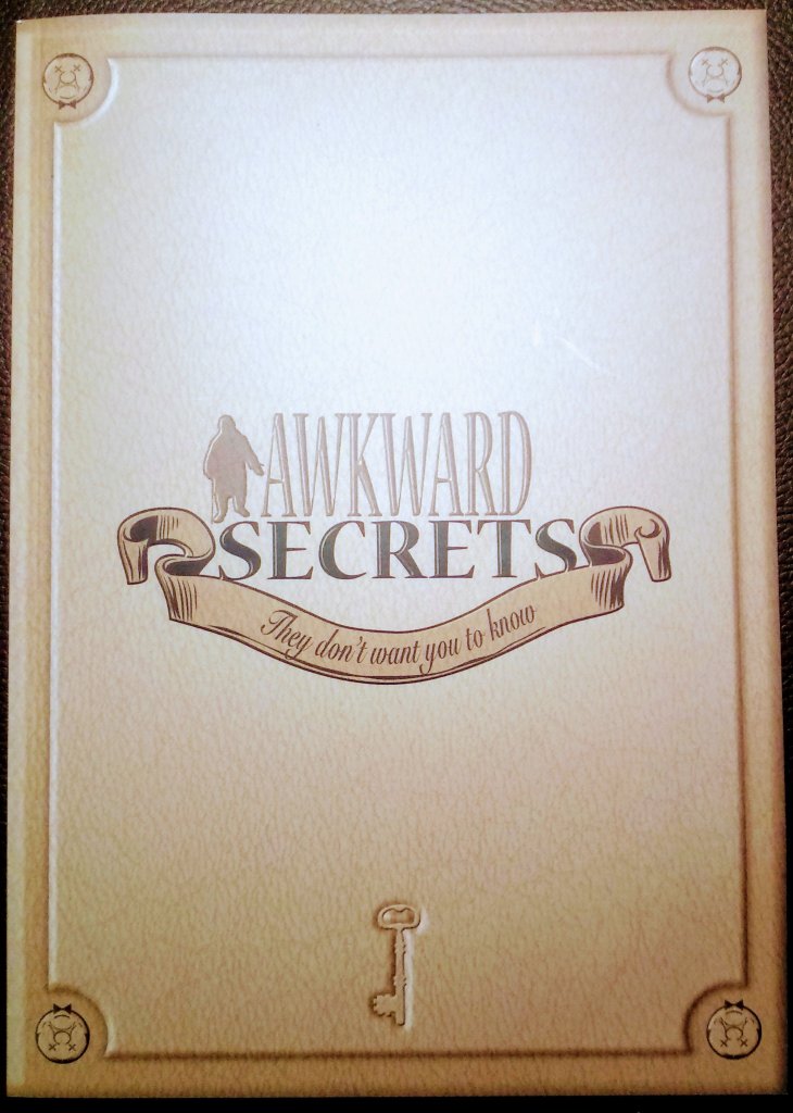 Awkward Guests: Awkward Secrets board game cover