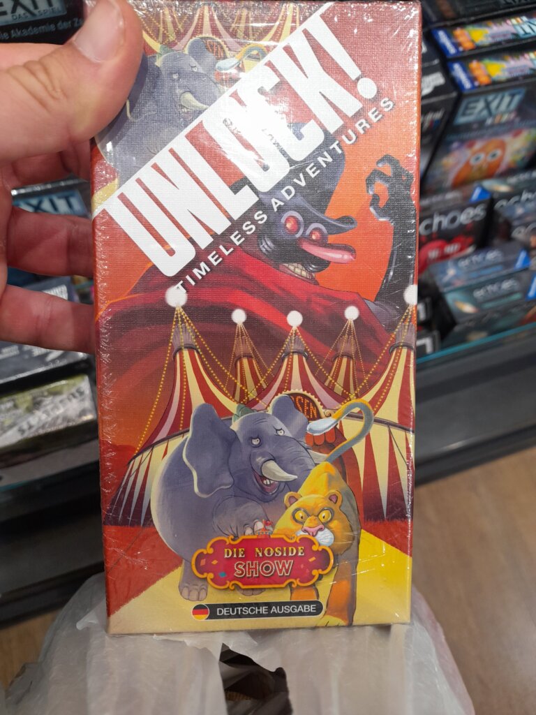 Unlock!: Timeless Adventures – Die Noside-Show board game cover